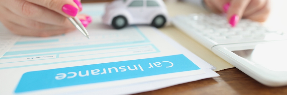 Filling out rental car insurance claim form