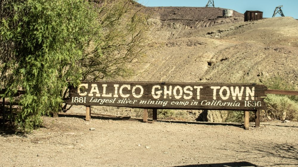 wooden sign marking a historic route