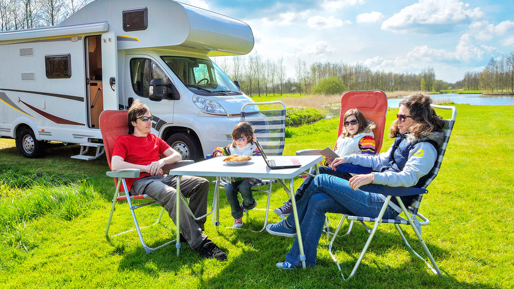 Family enjoying budget-friendly RV vacation