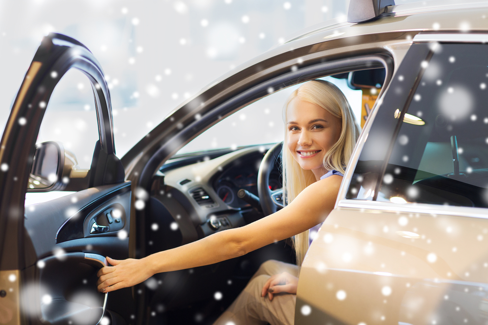 Customer with their snow-ready winter rental car